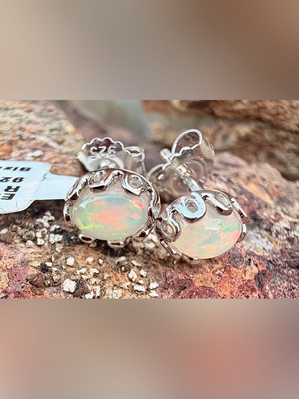 0.54 CTW White Opal Sterling Silver Rhodium Oval Stud Earrings
